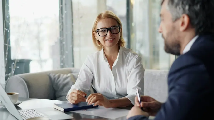 An advisor explaining insurance options to a client